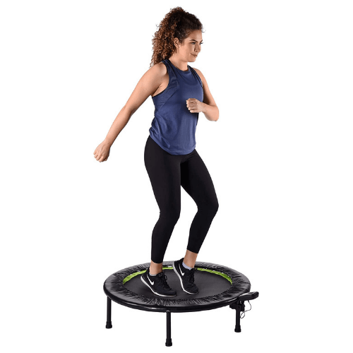 Woman jumping on trampoline