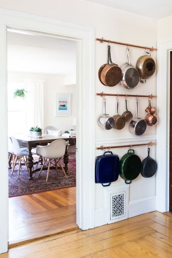 pots and pans on wall