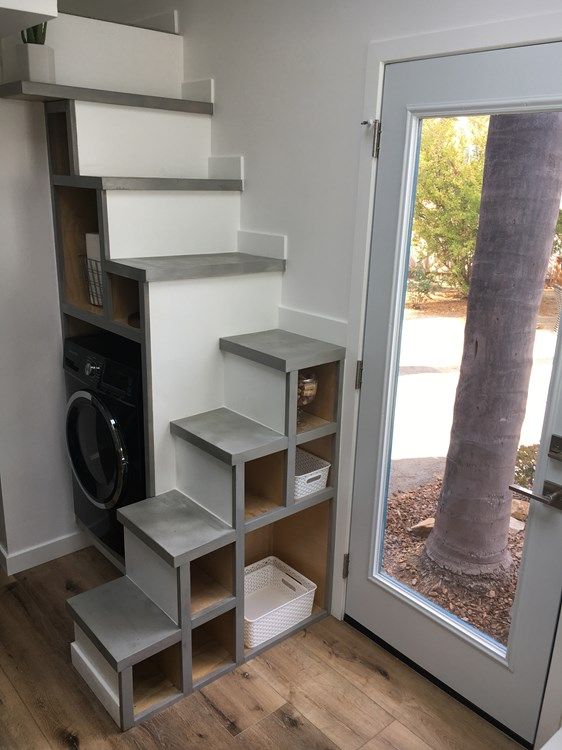 washing machine under stairs