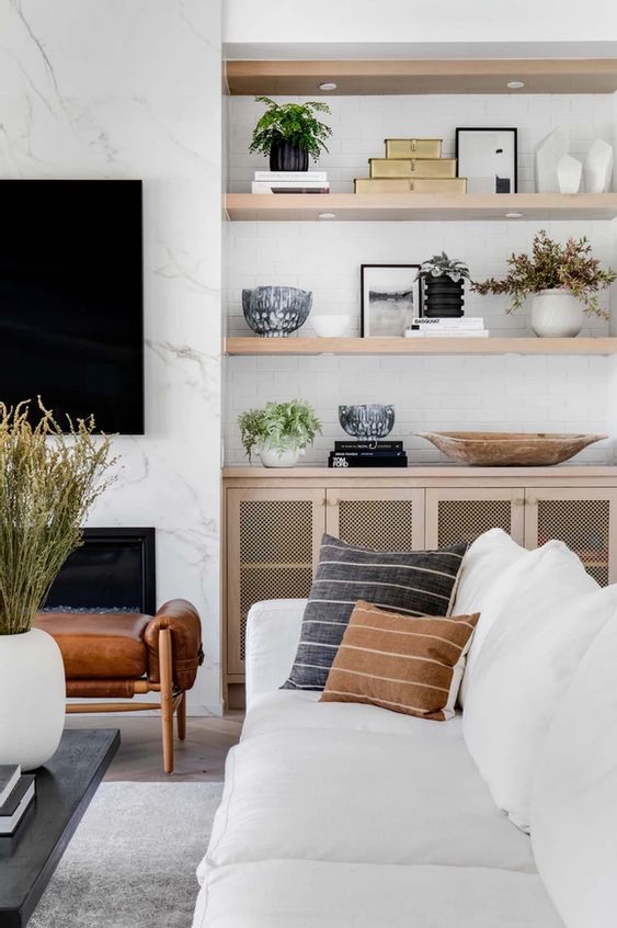 floating shelves beside fireplace