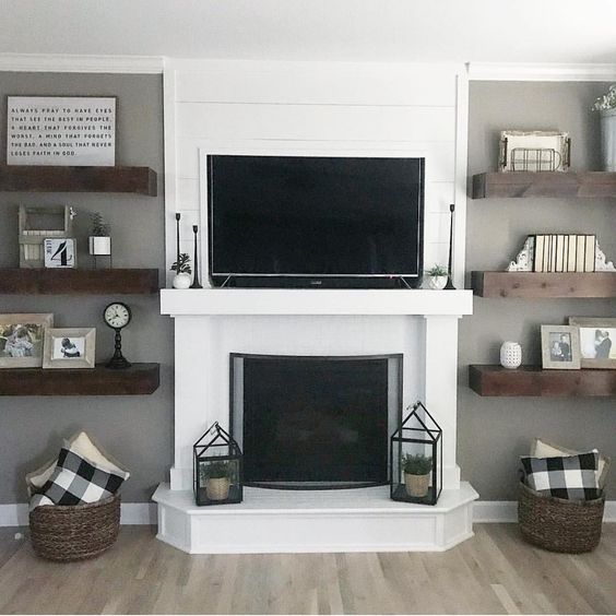 fireplace with floating shelves on both sides 