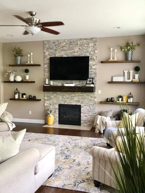 fireplace with floating shelves on both side