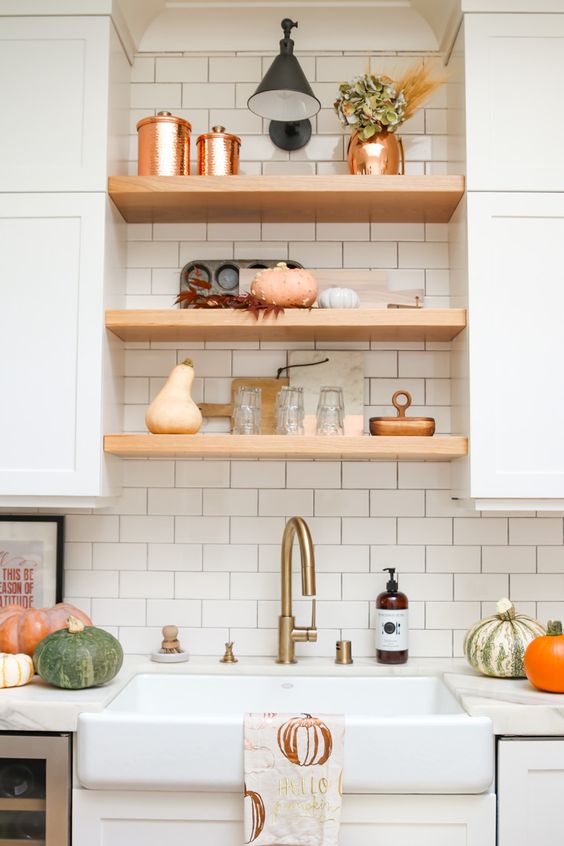 kitchen floating shelves between cabinets