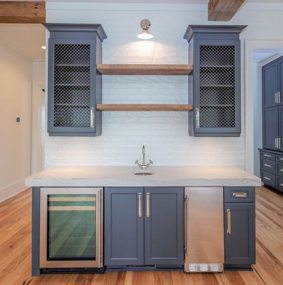 modern floating shelves between cabinets