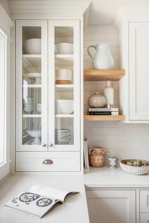 very small floating shelves between cabinets