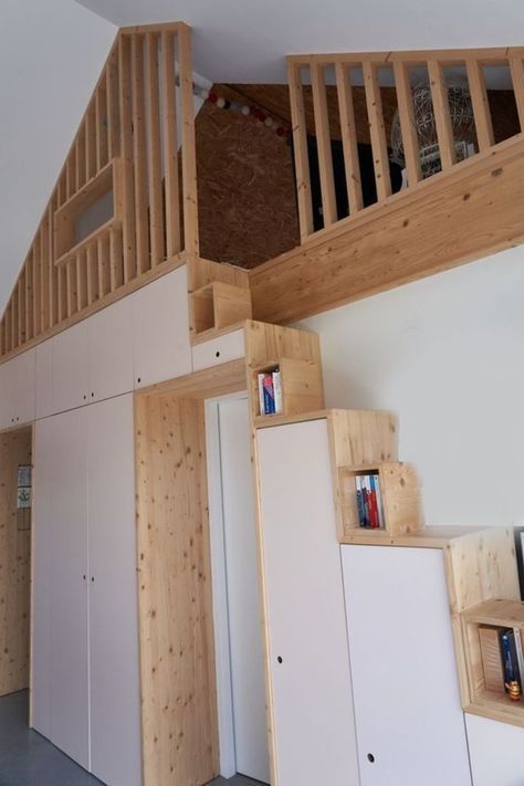 Loft staircase with integrated cabinets