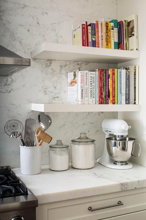 cookbooks on kitchen shelves