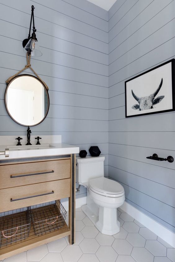 shiplap wall panels in small bathroom