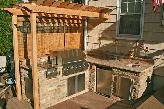 small rustic l shaped outdoor kitchen