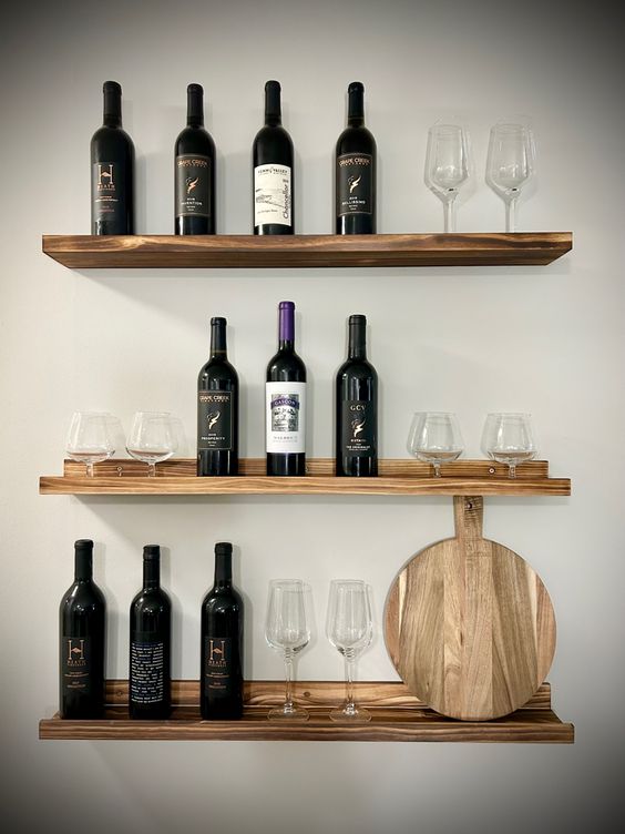 wine glasses on floating shelves kitchen