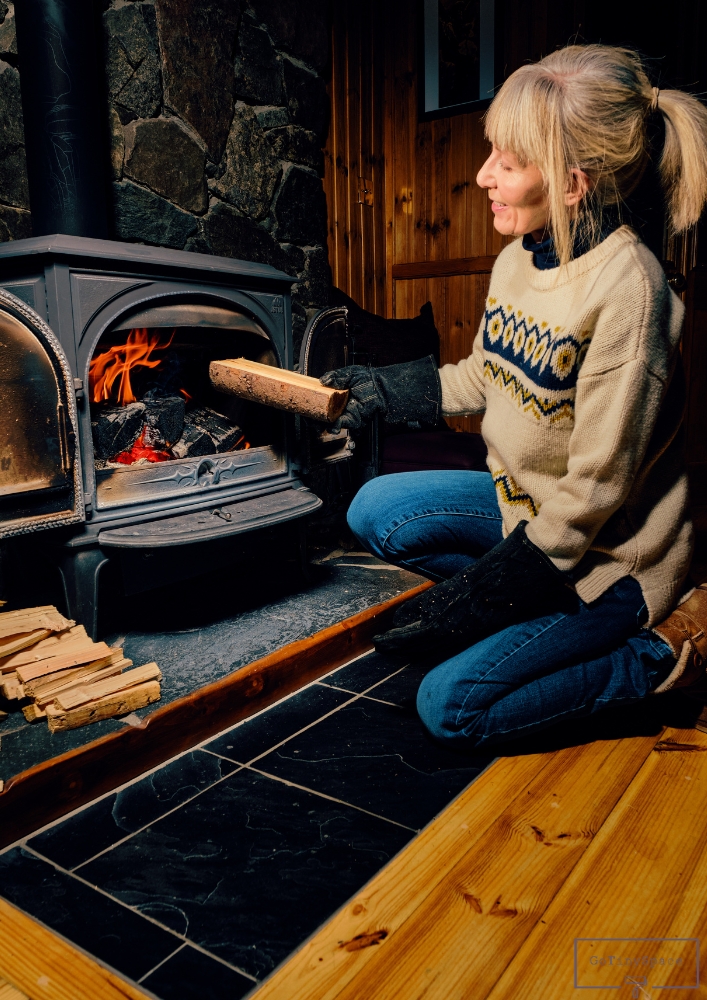 small wood burning stove in cabin