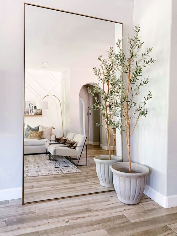small living room with mirror