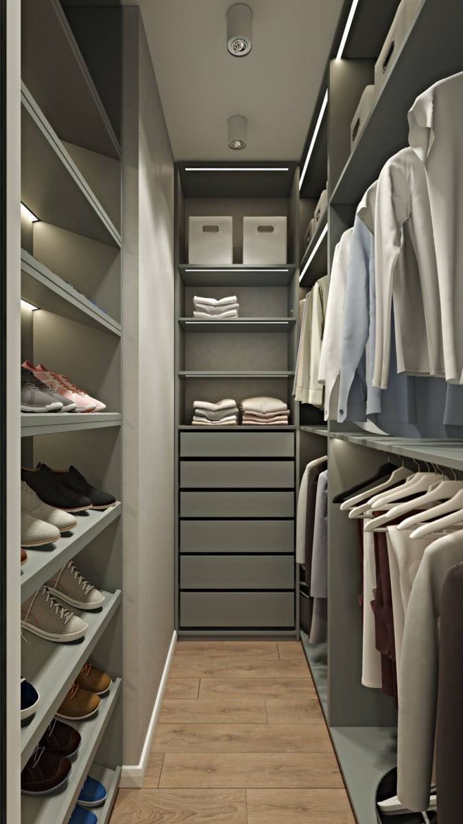 small walk in closet with drawers
