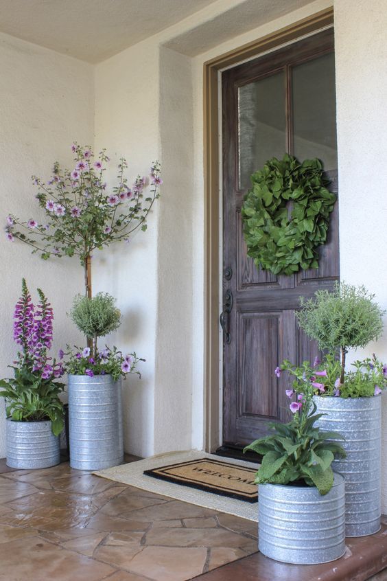 Galvanized Planters in a small porch